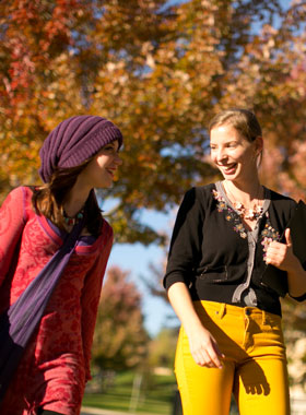Communication Studies students walking in the fall.