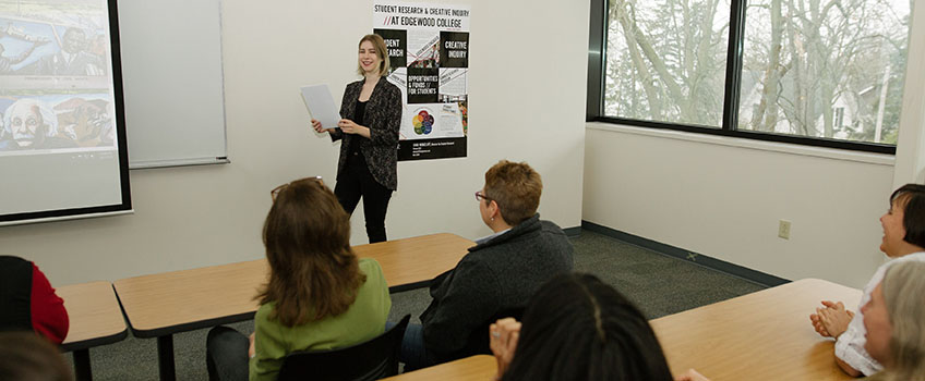 Maggie presents research on campus