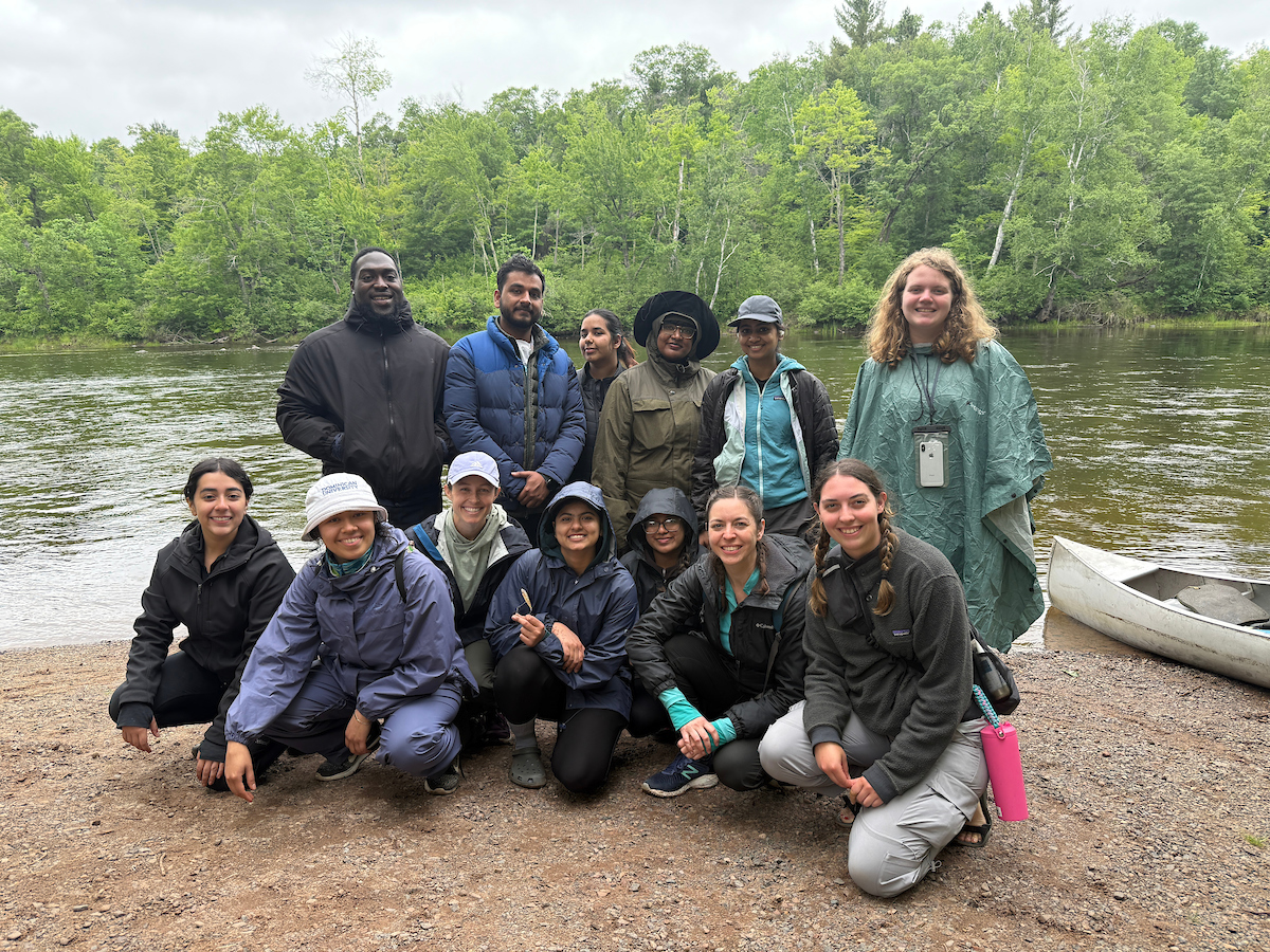 A group photo of students and staff.