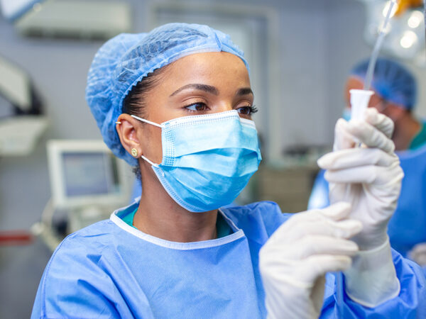 Doctor holding medical equipment