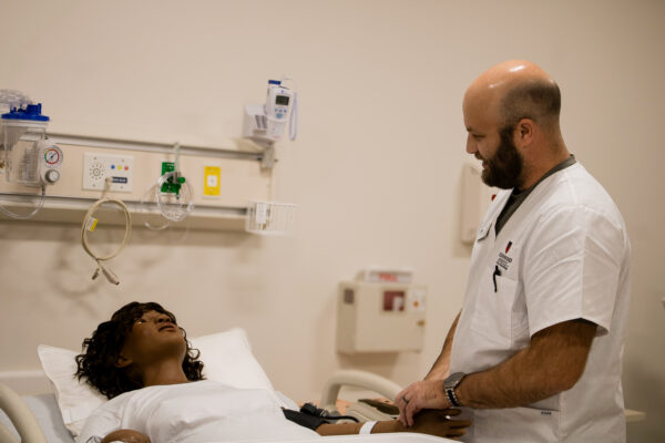 man talking to patient