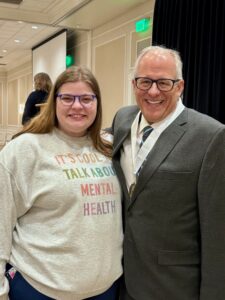 Professor Tarrell and former student