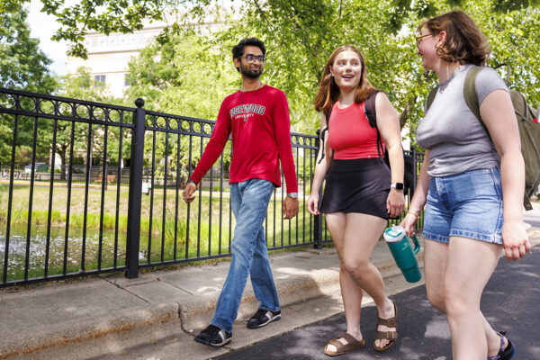 Three students walking